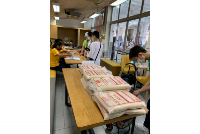 中一義工派米行動